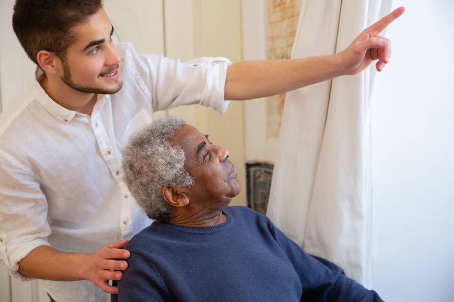 Caregiver gently checking in with a loved one at home